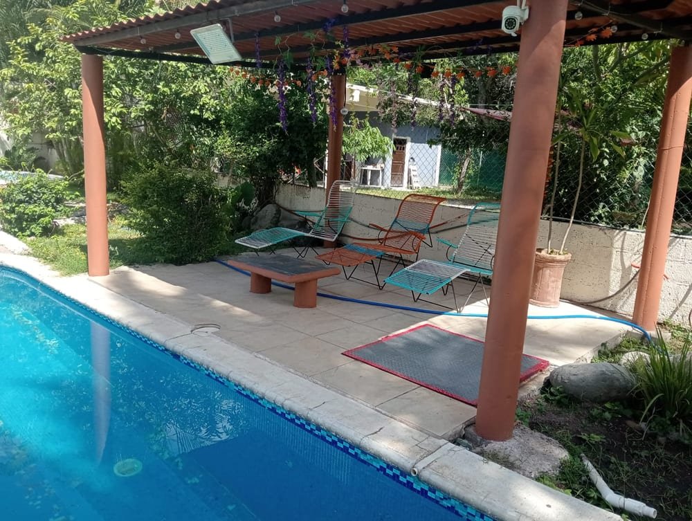 Quinta Jardín Secreto · palapa y área de descanso